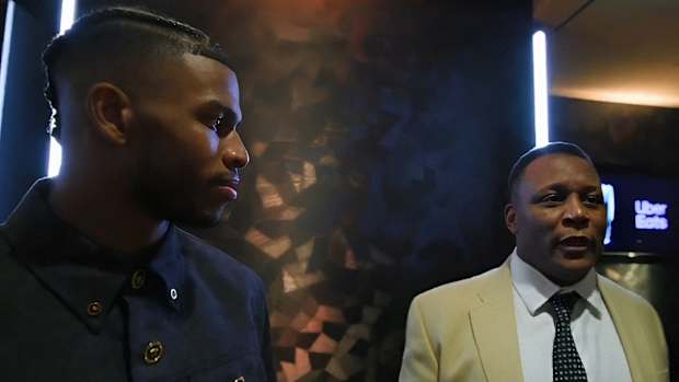 Shilo Sanders with Barry Sanders at NFL Honors before Super Bowl 58